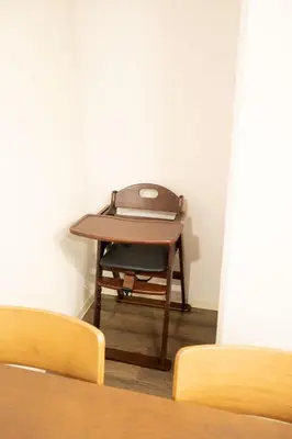 a desk in a room with a chair and a table at Vacation Inn Omorikaigan in Tokyo