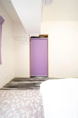 a door in a room with a purple door at Vacation Inn Omorikaigan in Tokyo