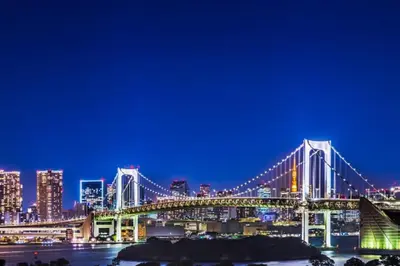 a view of a bridge at night at Sensoji 2ppl Apt in Tokyo