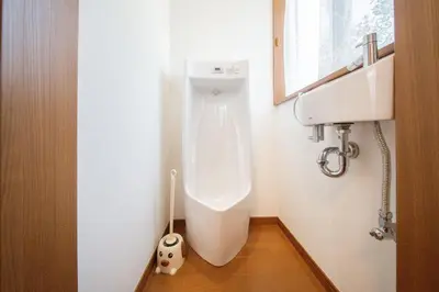 a bathroom with a toilet in the corner at Kashikirikotate - Vacation STAY 18912 in Tokyo