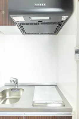 a kitchen with a hood over a sink at Marvelous Higashikanda - Vacation STAY 85125v in Tokyo