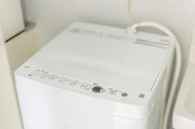 a white washer and dryer in a room at Marvelous Higashikanda - Vacation STAY 88199v in Tokyo