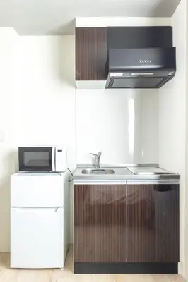 a kitchen with a sink and a microwave at Marvelous Higashikanda - Vacation STAY 86902v in Tokyo
