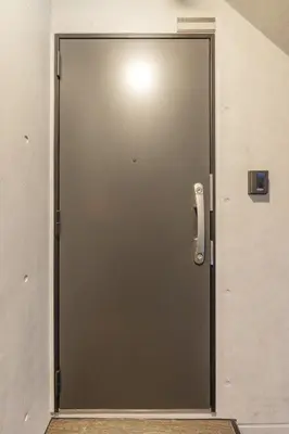 a metal door with a light on top of it at Marvelous Higashikanda - Vacation STAY 86902v in Tokyo