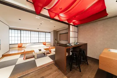 a hotel room with a bed and a desk at Solvana Akasaka in Tokyo