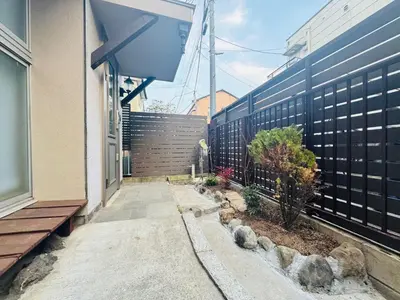 a porch of a house with a fence and plants at STS-Toyama house-SJ0188 in Tokyo