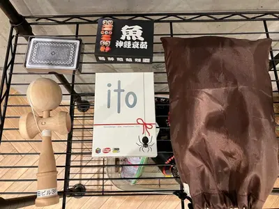 a shopping cart with a sign that says ittoc at \u539f\u7530\u5c4bHotel 3F in Tokyo