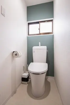 a bathroom with a white toilet with a window at Fullhouse 202 in Tokyo