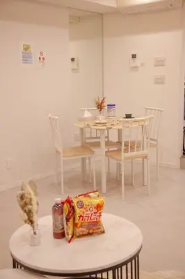 a room with a table with snacks on it at \u68ee\u4e0b\u5c0f\u5c4b in Tokyo