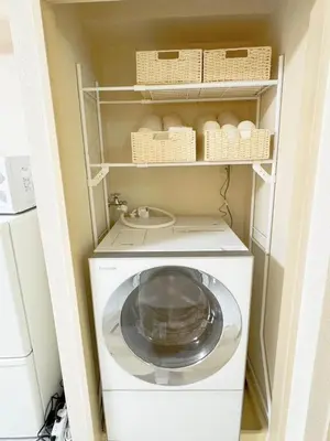 a washer and dryer in a small room at F-Mansion210 in Tokyo