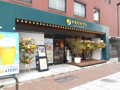 a store front of a flower shop on a street at Grand Central Hotel in Tokyo