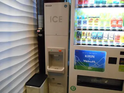 an ice machine in a store with a drink dispenser at Grand Central Hotel in Tokyo