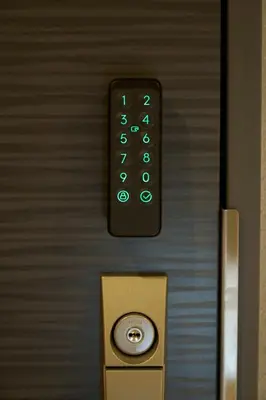 a close up of a remote control on a door at Nomadland Shinagawa Omori 1104 in Tokyo