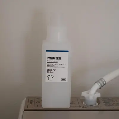 a bottle of sunscreen sitting on top of a shelf at LOFT-Hatsudai hostel\u521d\u53f0SY0362 in Tokyo