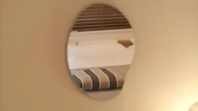 a bedroom with a bed and a mirror at Cozy Nest Sangenjaya 1 Stop to Shibuya \u30fcWalk to Sangenjaya and Ikejiri in Tokyo