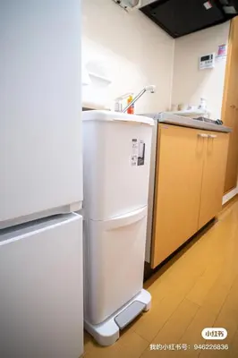 a kitchen with a white refrigerator and a sink at sitamachi Shin-Koiwa 302 in Tokyo
