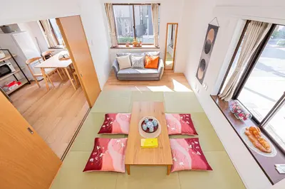 a view of a living room with a table at Akabanestay A \u5fd7\u8302 in Tokyo