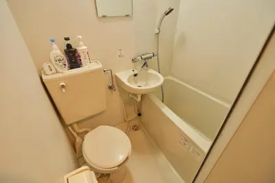 a small bathroom with a toilet and a sink at \u65b0\u5bbf\u533a\u6b4c\u821e\u4f0e\u753a\u5f92\u6b65\u4f0a\u52bf\u4e39\u54e5\u65af\u62c9\u623f\u6e9004 in Tokyo