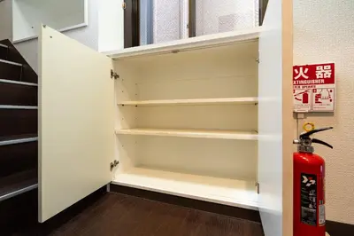 a room with a fire hydrant in a closet at Maison Miyashita in Tokyo