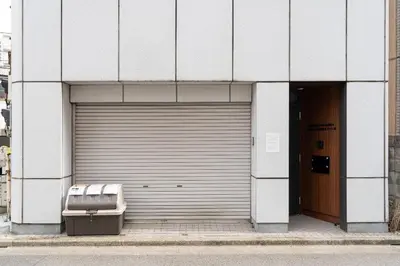a large garage door with a door opener at Maison Miyashita in Tokyo