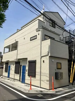 a building on the side of a street at Hotel Ikebukuro Fine Coat in Tokyo
