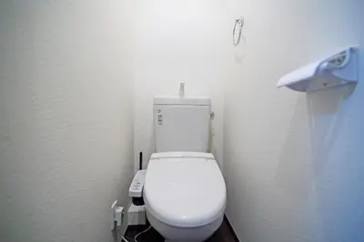 a bathroom with a white toilet in a stall at Central Shinjuku, Quiet Area, Close to Station, No Stairs, Room101 in Tokyo