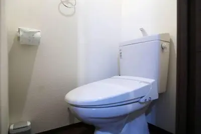 a bathroom with a white toilet in a room at Close to Station, Quiet Area, Central Shinjuku, Room 203 in Tokyo
