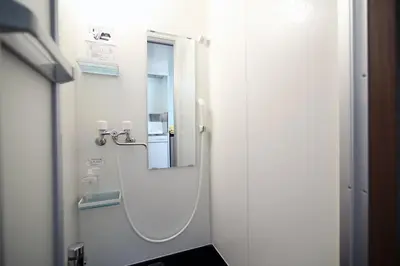 a bathroom with a sink and a mirror at Central Shinjuku, Quiet Area, Close to Station, Room205 in Tokyo