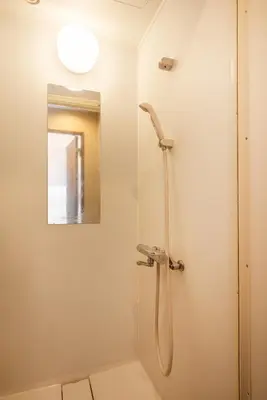 a bathroom with a shower and a mirror at R201-Shinjuku 13 min Up to 8 people 60 sqm Full renovation Roppongi and Tsukiji direct access Family group 7 min to Ochiai Minami Nagasaki Station in Tokyo