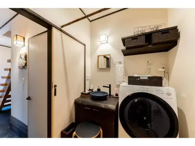 a laundry room with a washing machine in it at YADOYA Ryusenjicho - Vacation STAY 86915v in Tokyo