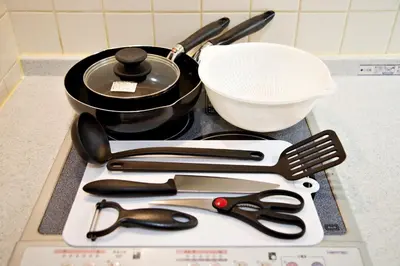 a bunch of kitchen utensils sitting on a stove at Regalia Hills Shibuya Dogenzaka - Vacation STAY 18960 in Tokyo