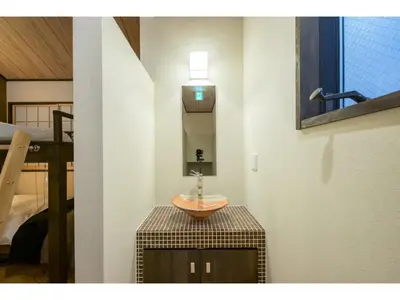 a bathroom with a sink on top of a table at YADOYA Matsugaya - Vacation STAY 91980v in Tokyo