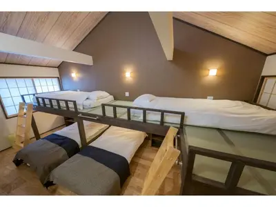 a room with two bunk beds in a house at YADOYA Matsugaya - Vacation STAY 91980v in Tokyo
