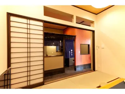 a room with a sliding glass door with a kitchen at YADOYA Asakusa-Honkan - Vacation STAY 92044v in Tokyo