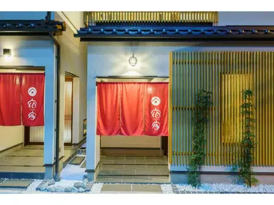 a pair of red curtains on the side of a building at YADOYA Yanagitori West - Vacation STAY 92053v in Tokyo