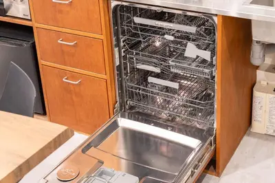 an empty dishwasher in a kitchen with a sink at \u5922\u306e\u5bbf \u97ff 125t in Tokyo