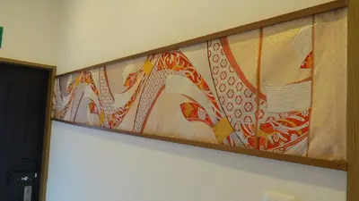 a painting hanging on a wall in a room at Y's INN Oyama 021T in Tokyo
