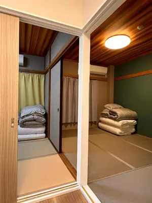 a room with a closet with a mirror and a bed at \u516b\u5e83101Nearby Tokyo Skytree in Tokyo