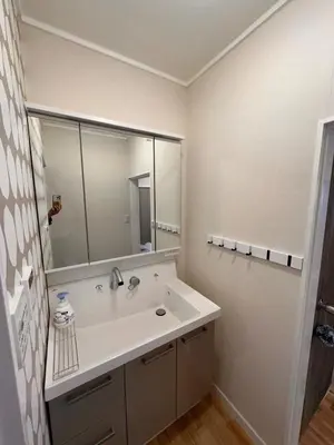 a bathroom with a sink and a large mirror at \u516b\u5e83201Nearby Tokyo Skytree in Tokyo