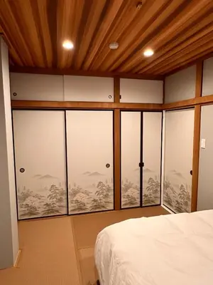 a bedroom with large glass windows and a bed at \u516b\u5e83201Nearby Tokyo Skytree in Tokyo