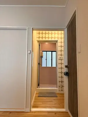 a hallway with a door leading into a room at \u516b\u5e83201Nearby Tokyo Skytree in Tokyo