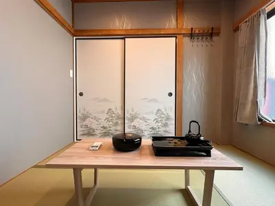 a table in a room with a glass window at \u516b\u5e83201Nearby Tokyo Skytree in Tokyo