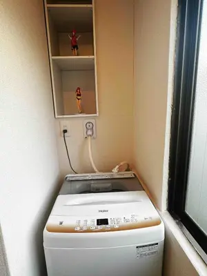 a toilet in a bathroom with a mirror above it at 八広301 Nearby Tokyo Skytree & Asakusa in Tokyo