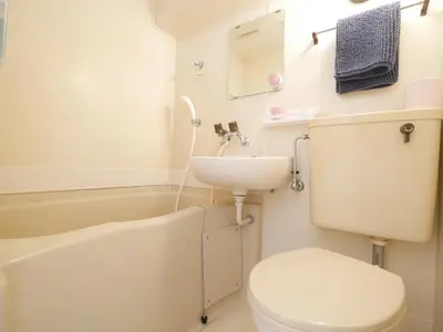 a bathroom with a toilet and a sink at CasaN 402 in Tokyo