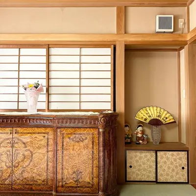 a room with a wooden cabinet and a window at ookubo hills Unique 3 Bedroom House in Shinjuku area in Tokyo