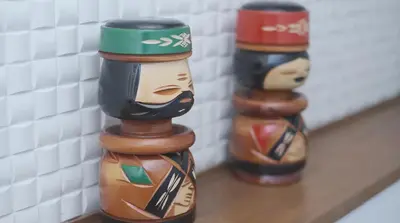 two wooden vases sitting on top of a shelf at Lucky house west Kitasenju in Tokyo