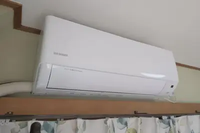 a white television on top of a shelf at Lucky house west Kitasenju in Tokyo