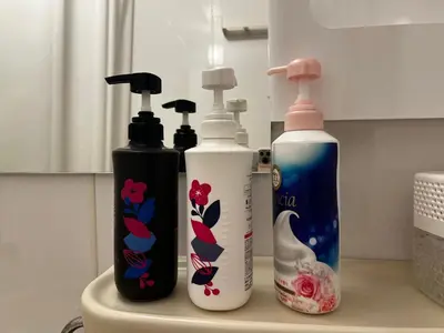 a group of three bottles sitting on top of a counter at SHINJUKU station 10min by walk! KB House in Tokyo