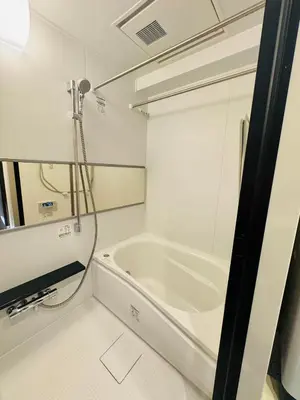 a white bathroom with a tub and a shower at Kabukicho-13F-SJ0019 in Tokyo