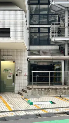 a building with a door in the side of it at F-Mansion209 in Tokyo